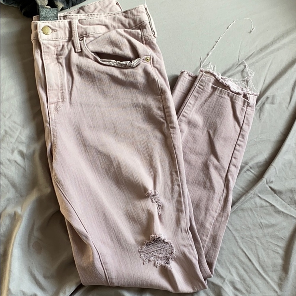 Light purple ripped jeans